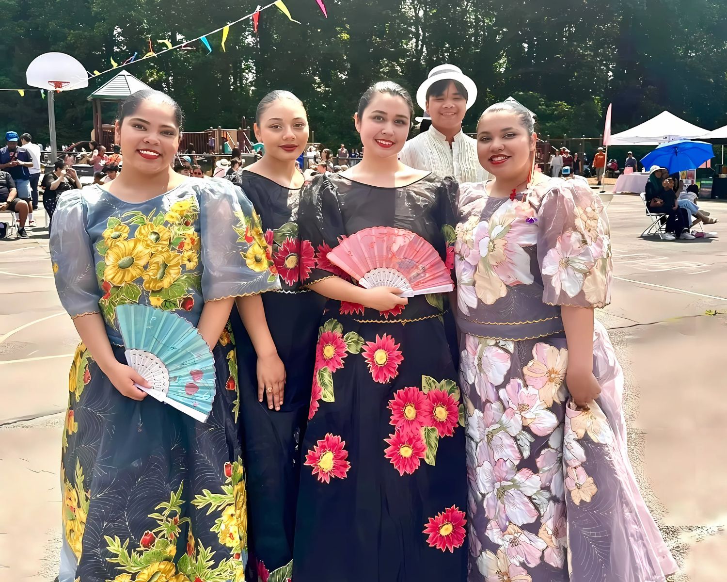 Filipino cultural dancers performing a traditional folk dance at Fil-Am Spring Fest, a vibrant Filipino-American festival and fundraiser