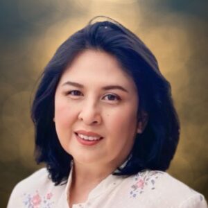 Mariflor Reyes, Board Member of Fil-Am FEST Inc., smiling warmly, reflecting her dedication to service and community impact.